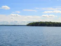 Stunning Sunrises from spacious Big Round Lake Cabin Hotels in Round Lake