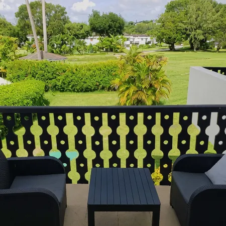 Peaceful intensely clean unit overlooking tropical gardens and golf course
