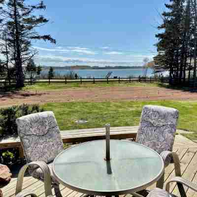 Waterfront 2 BR cottage on 1 acre private lot walking distance to beaches! Others