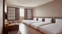 Orange Hotel Wenhua - albergo