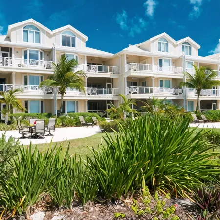 Walk Out of this Elegant 2 Bedroom Condominium On To Stunning Grace Bay Beach!