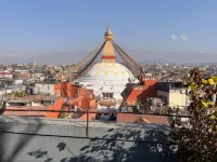Rich Red Carpet room with a Boudha view Balcony -  Ferienwohnungen