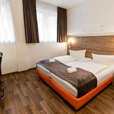 Orange Hotel und Apartments