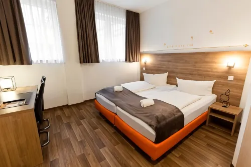 Orange Hotel und Apartments