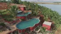Fazlani Natures Nest - the Wellness Retreat - สระว่ายน้ำแบบอินฟินิตี้