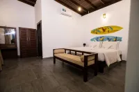 NatureSurf Villas - Private Garden Retreat at Hiriketiya Beach Yoga, Surf & Relaxation Hotels in Dikwella