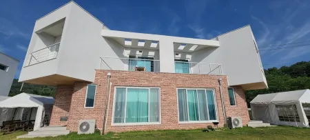 Jangseong Suyangho Pension Отели в г. Чансон