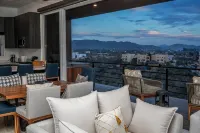 Quick walk to Cerritos Beach, private Hot tub, pool, gym, ocean & mountain VIEWS
