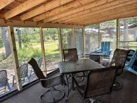 Parkmodel cabin w screened porch in campground on bike trail.