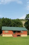 Beautiful cabin style home backing up on the White River!