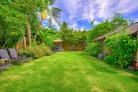 Tropical Garden Family Home & Penthouse - Sleeps 8 Walk to Beach, BBQ, Hot Tub - Gym