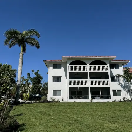End unit with extra windows. Steps to the beach, private beach access!