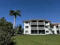End unit with extra windows. Steps to the beach, private beach access!