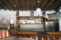 Taman Unique Hotel - bar
