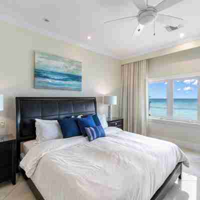 Prime Residence #6 on 7 Mile Beach, High-End Ground Floor Beachfront Condo Rooms