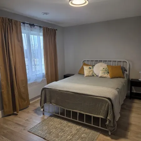 East Royalty Modern lower level apartment.