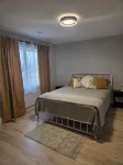 East Royalty Modern lower level apartment.
