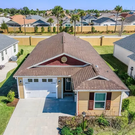 Upgraded Home in The Villages! Golf Cart Included, Community Pools and Much More