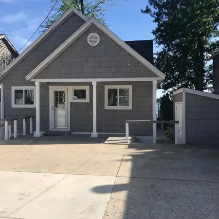Experience Lake Life at Our 3-Bedroom Beachfront Cottage, Near Grand Rapids.