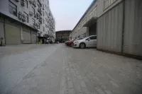 New Era Business Hotel (Anqing Wuyue Plaza Branch) - Bãi đậu xe