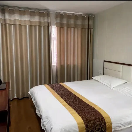 Xinjia Business Hotel