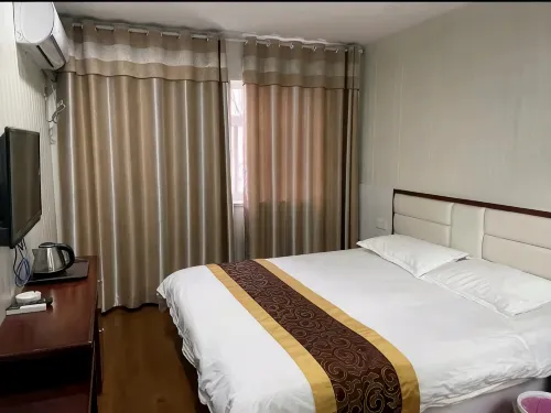 Xinjia Business Hotel