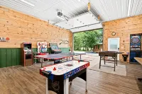 Secluded 4-season cabin w/private waterfront, epic game room & mins from trails