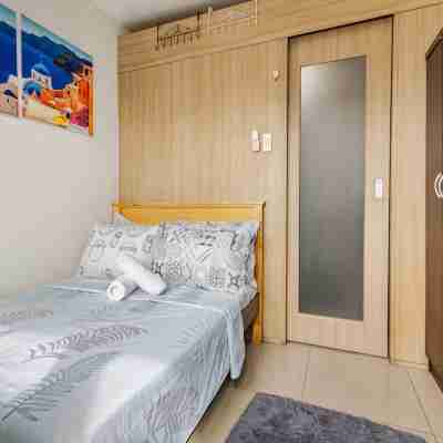 The Golden Shore Suites Rooms