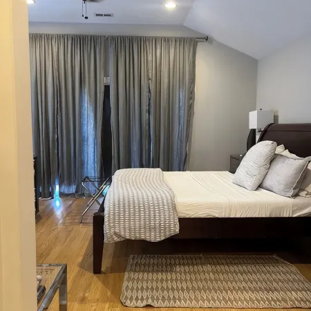 Spacious & Stylish Home with Garage + Rooftop Deck. 10 min Walk to Train.