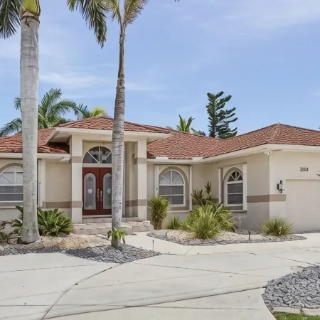 MAGNIFICENT! LUXURY WATERFRONT HOME;BIG HEATED POOL-80’ DOCK! 5 MIN FISH VILLAGE