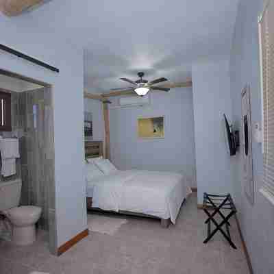 Bze Nature Nook – 2 Private 1BR Suites, Lagoonfront, Gated, 10 Min from Airport Rooms