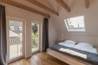 "Brunnenhaus": Stylish vacation home with Mediterranean courtyard and huge garden - Homestays