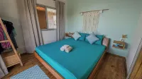 Ocean Light Over Water Bungalow, Bedroom, King Bed, Living Room, Kitchenette