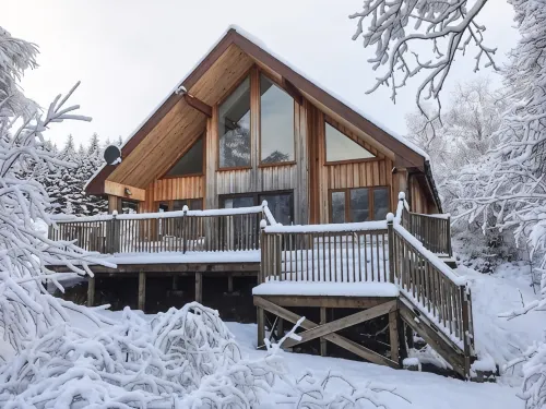 Grianain - Riverside Lodge with Mountain Views - Pensions