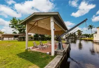 Offering Breathtaking Views of the Sun Setting over the Water. - Homestays