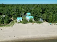 Stunning, fully appointed home on a sugar sand beach of Lake Huron. Hotels in Alcona County