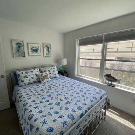 One mile to the beach!  2 br condo with deck, A/C, full kitchen, washer, dryer
