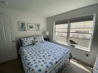 One mile to the beach!  2 br condo with deck, A/C, full kitchen, washer, dryer - Gym