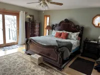 Waterfront retreat on 7 private wooded acres with beautiful sunset views. - 4-Star