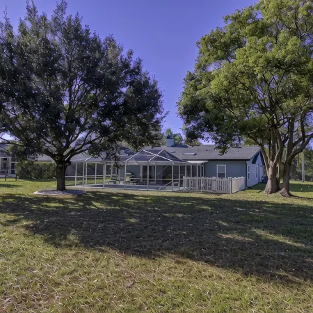 Four Beds, three baths, heated pool, and a Golf Course. What more do you need!!