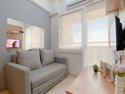 Compact 2BR Apartment Direct Access to Mall at Green Pramuka City By Travelio