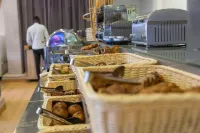 Millenium Suites - servizio colazione