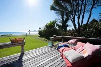 Beachside Bach - Long Beach - Absolute beachfront!  Great family holiday home.