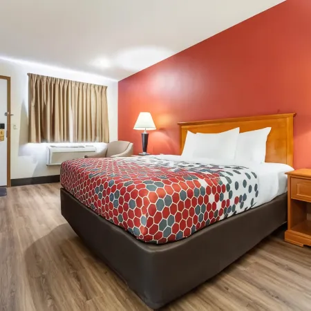 Econo Lodge Отели в г. Су