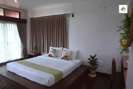 Vijitnakorn Nonpak Hotel Отели рядом с достопримечательностью «Wat Chiang Ei Si Mongkol Wararam»