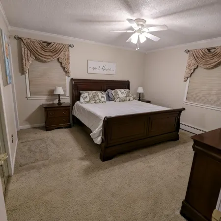 Cozy lake view home, centrally located with lake access and private dock!
