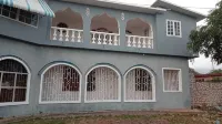 Spacious 9-bedroom house with WiFi & AC in amazing St Jago Heights Spanish Town Hotels in 