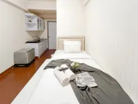 Homey Studio at Apartment Suites @Metro By Travelio