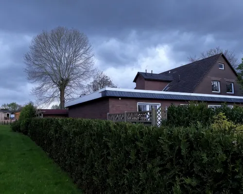 Holiday home in a quiet location in the center of Nordseebad Tossens Hotels in Tossens