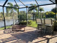 SO. GULF COVE - WATERFRONT HOME ON CANAL-SALT WATER POOL & SPA-NEAR GULF BEACHES - Strand